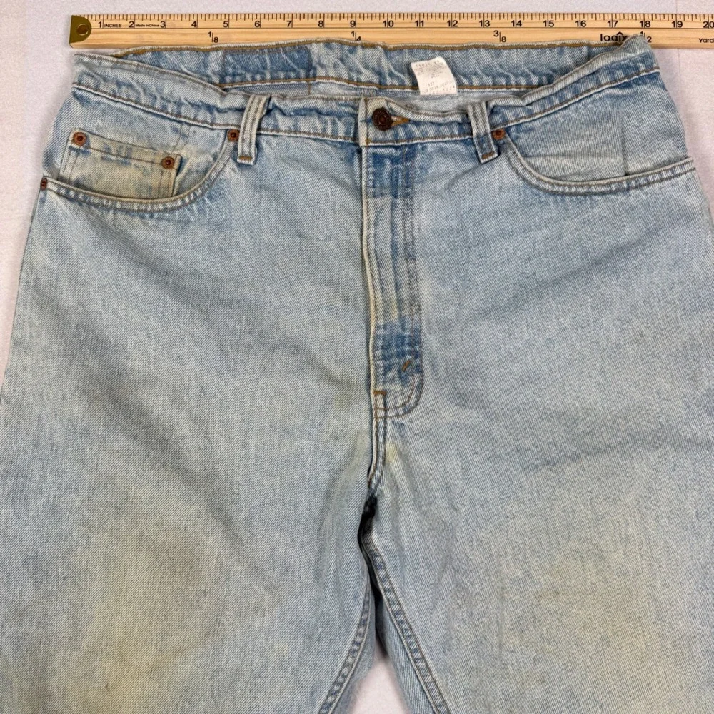 Vintage 90s Levis 550 Relaxed Fit Tapered Jeans Light Wash 38x28 Made in USA